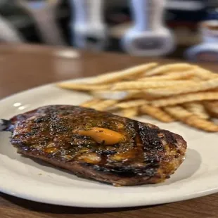 a steak and french fries
