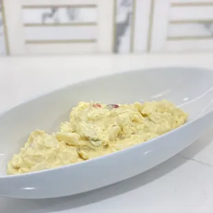 a bowl of mashed potato salad