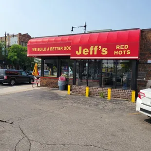 cars parked in front of the restaurant