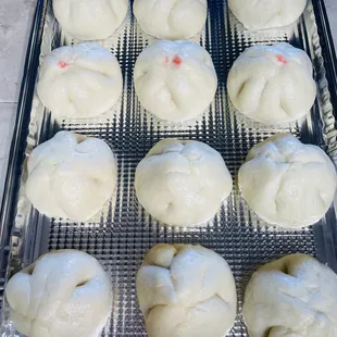 a tray of freshly made buns