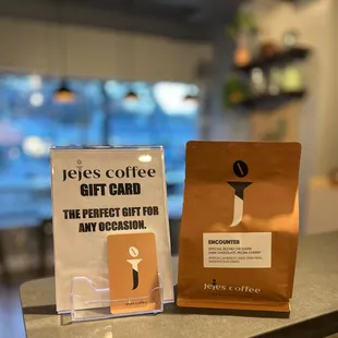 Our coffee bag and gift card - redeemable at jejescoffee.com and jejescoffeehouse.com.