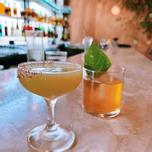 two cocktails on the bar