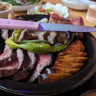 a steak and vegetables on a plate