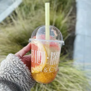 a cold drink in a plastic cup