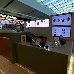 a counter with a laptop on it