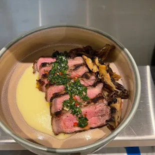 a bowl of food on a stove