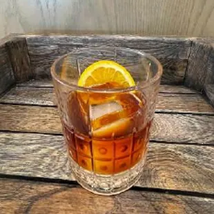 a drink on a wooden tray