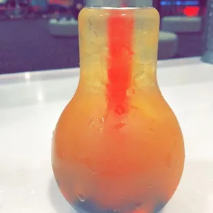 passionfruit pearl drink with boba and heart shape strawberry jelly