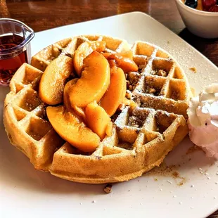 Peach Pecan Waffle with a side of fresh fruit