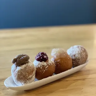 Donut holes (Mexican chocolate, jelly filled, lemon filled, cinnamon sugar)