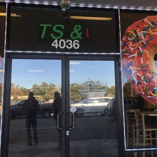 the front door of a donut shop