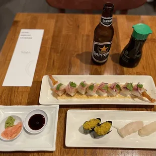 Citrus Hamachi roll, tobiko and escolar sushi