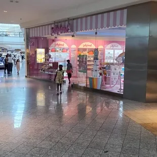 The girls walking into the store