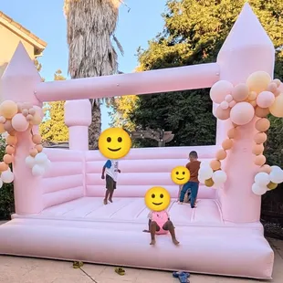 Blossom bounce house with balloon cluster add ons