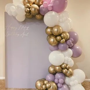 balloon garland with backdrop and custom decal