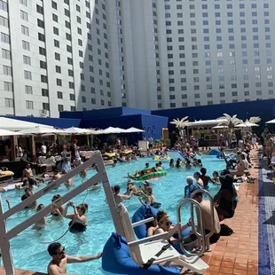 a large pool with people in it
