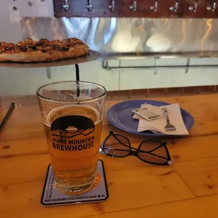 Sausage and green chile pizza and a hoppy IPA. Yum.