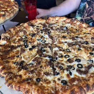 Homemade fennel sausage and black olives.
