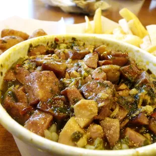 gumbo (with hush puppies and fries in the back)