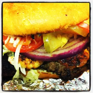 Bayou Burger.  Blackened Shrimp on top of beef burger.  Fork and Knife Burger