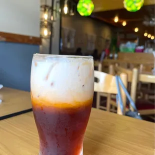a cold beverage in a glass