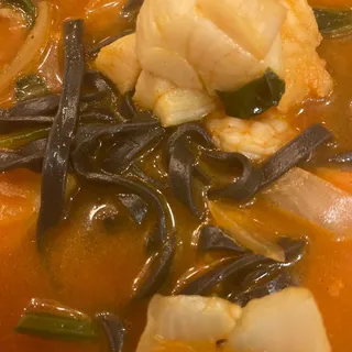 Spicy Seafood Medley with Squid Ink Noodle Soup