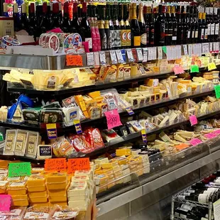 a variety of cheese and wine