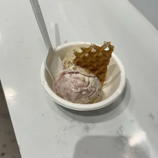 Standard with coffee with cream and sugar and powdered jelly donut