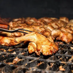 Chicken grilling on our open pit