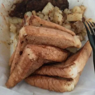 a plate of food and a fork
