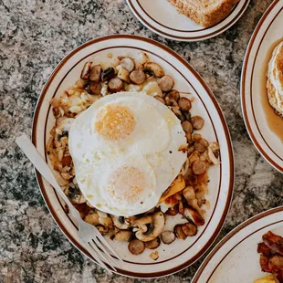 a breakfast of eggs, beans, toast and toast