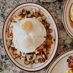 a breakfast of eggs, toast, and toast