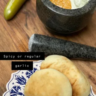 We have regular and our very own spicy garlic dip
With fresh oven baked bread