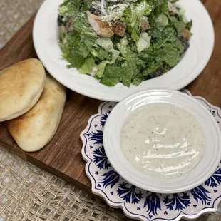 Chicken Caesar Salad with Caesar dressing and pita bread