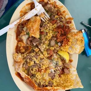 Raw chorizo. No cream or guacamole. Barely my meat and I ordered 2 mixed (chorizo and tongue). Super dry... on everything.