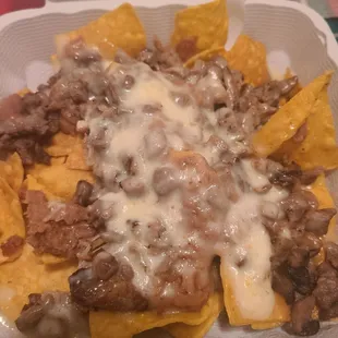 My super nachos. Around 12 bucks and no salsa sour cream or guacamole.  Don't know if the stopped putting them on the super nachos.