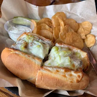 Dads Italian Beef sandwich with homemade chips and dip