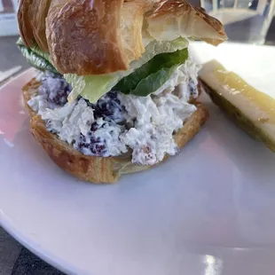 Chicken salad on croissant made with Greek yogurt, grapes and pecans.