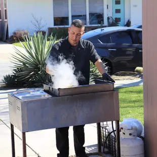 Jose G. grilling away.