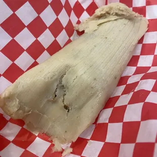 a partially eaten tamale