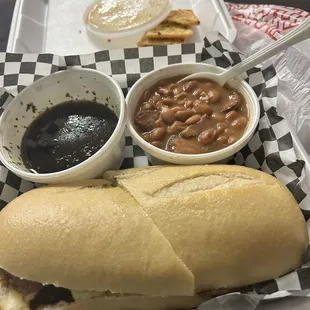 Tri tip sandwich with a side of Portuguese beans