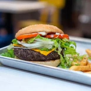 1/2 lb cheeseburger $9.50 + fries $4