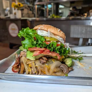The Challenger Burger $15 (avocado, bacon, cheese, lettuce, grilled mushrooms/onions, pickles and tomatoes)