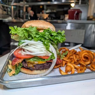avocado bacon cheeseburger $13.50 (xtra onions) with fries $5.25