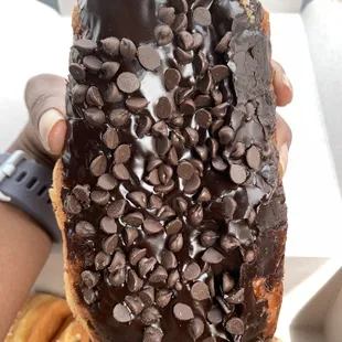 Vegan chocolate donut topped with chocolate chips