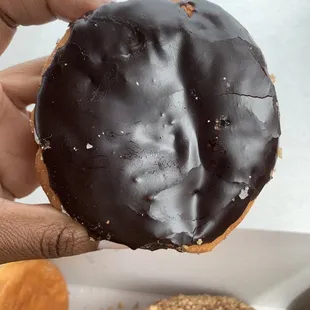 Chocolate topped cream filled donut