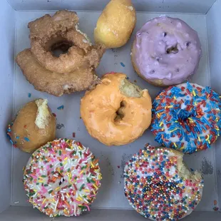 Vanilla cake with rainbow sprinkles, orange and blueberry cakes, old fashioned, donut holes!