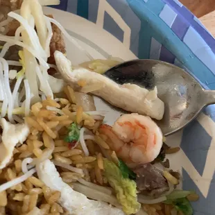 a plate of rice and shrimp