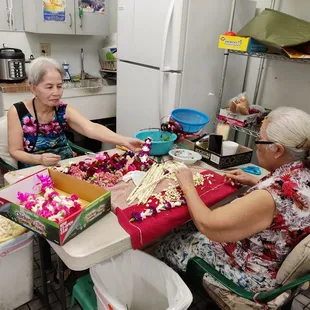 Lei making in action