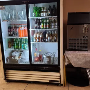 a refrigerator with drinks in it